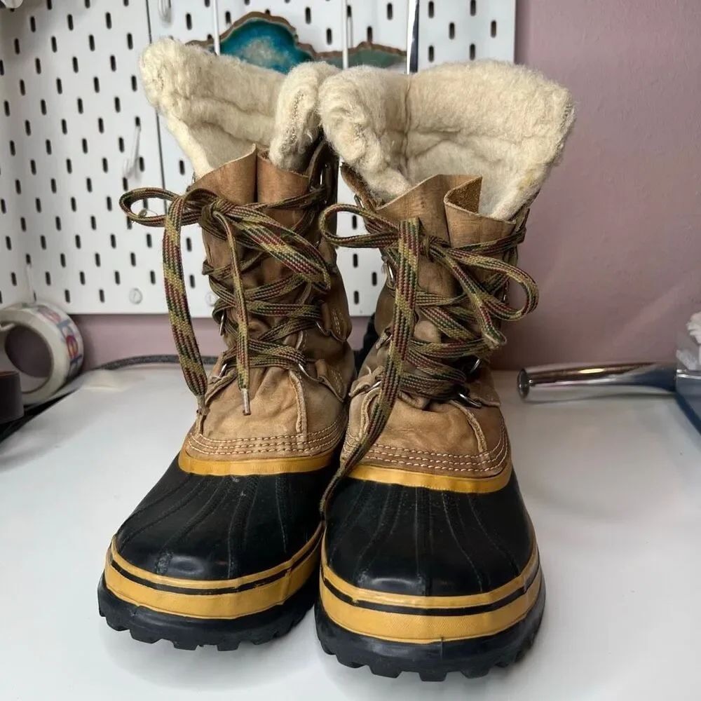 Sorel Caribou waterproof winter boots in tan leather featuring a distinctive cre